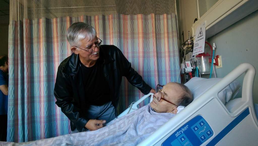 Wilhelm Szarca visits his friend Michael Geyer at a Toronto hospital.