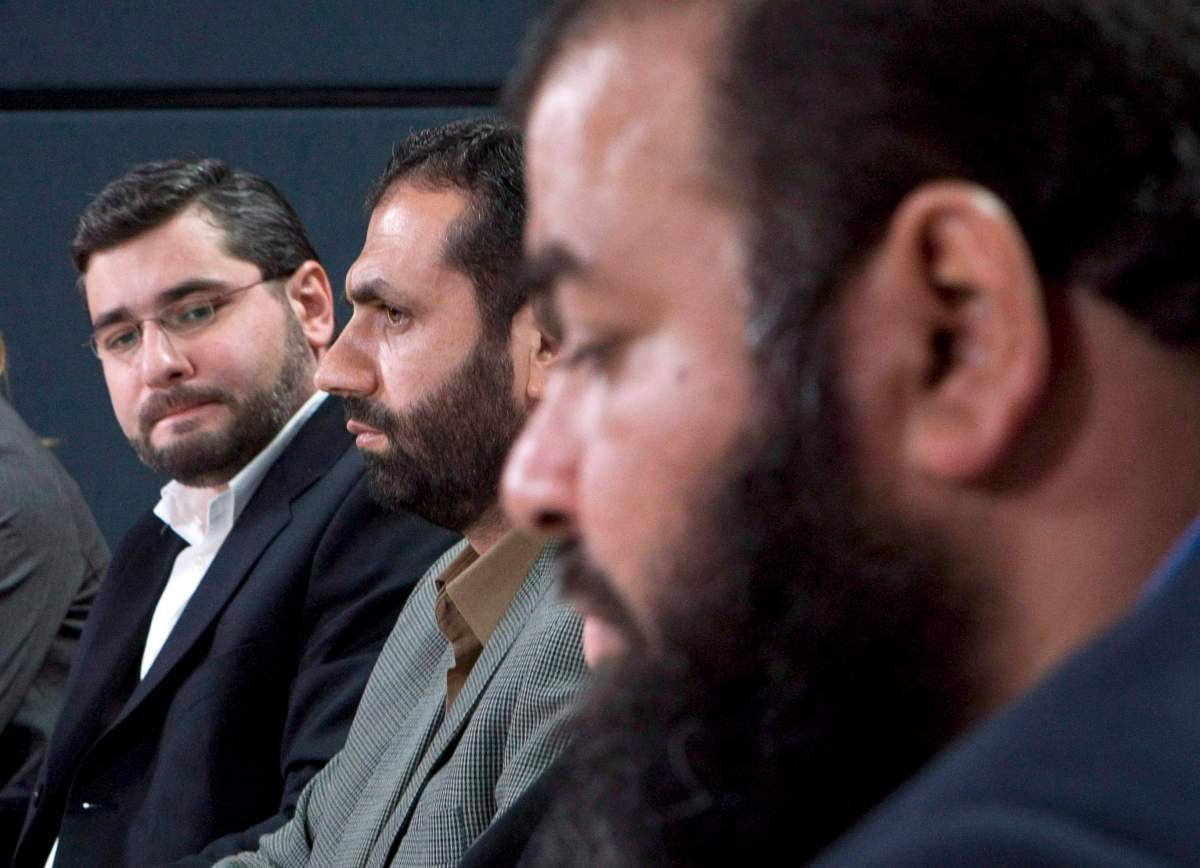 From left, Abdullah Almalki, Muayyed Nureddin and Ahmad El Maati comment on a report in Ottawa, in this Oct.21, 2008 photo. 
