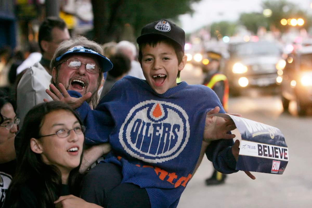 Oilers fans celbrate on Whyte avenue in Edmonton, Alberta, after the Oilers win game 6 of the Stanley cup playoffs, on Saturday June 17, 2006. Edmonton beat Carolina Hurricanes 4-0. CP Photo/Ian Jackson