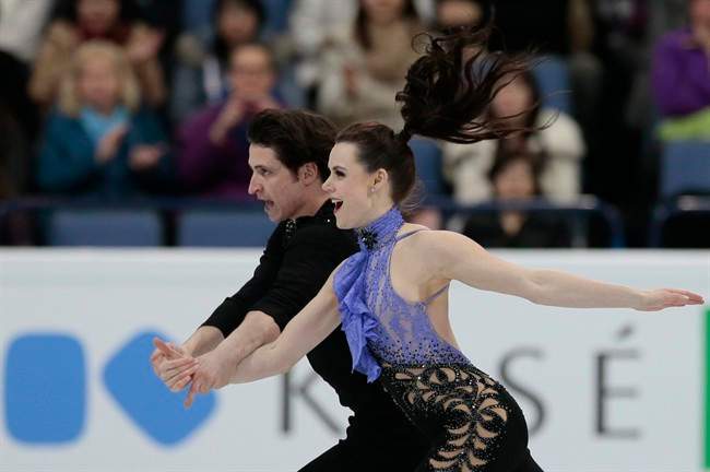 Tessa Virtue and Scott Moir, of Canada, skate their short dance at the World Figure Skating Championships in Helsinki, Finland, on Friday, March 31, 2017.