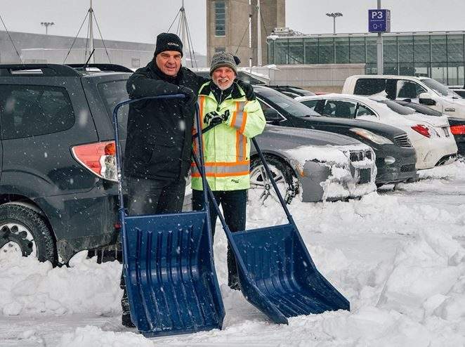 Pierre Elliott Trudeau Airport employees were out clearing snow-covered cars to make things a little easier for travellers, Thursday, March 16, 2017.