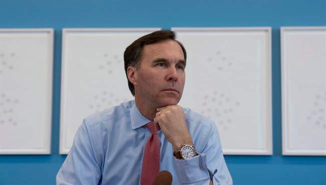 Finance Minister Bill Morneau takes part in a interview with The Canadian Press at his office in Ottawa, Thursday, March 23, 2017. 