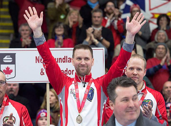 Newfoundland and Labrador skip Brad Gushue waves to the crowd after defeating Team Canada 7-6 to win the Tim Hortons Brier curling championship at Mile One Centre in St. John\’s on Sunday, March 12, 2017.