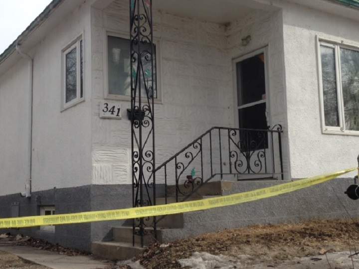 Police tape surrounds a home on Burrows Avenue.