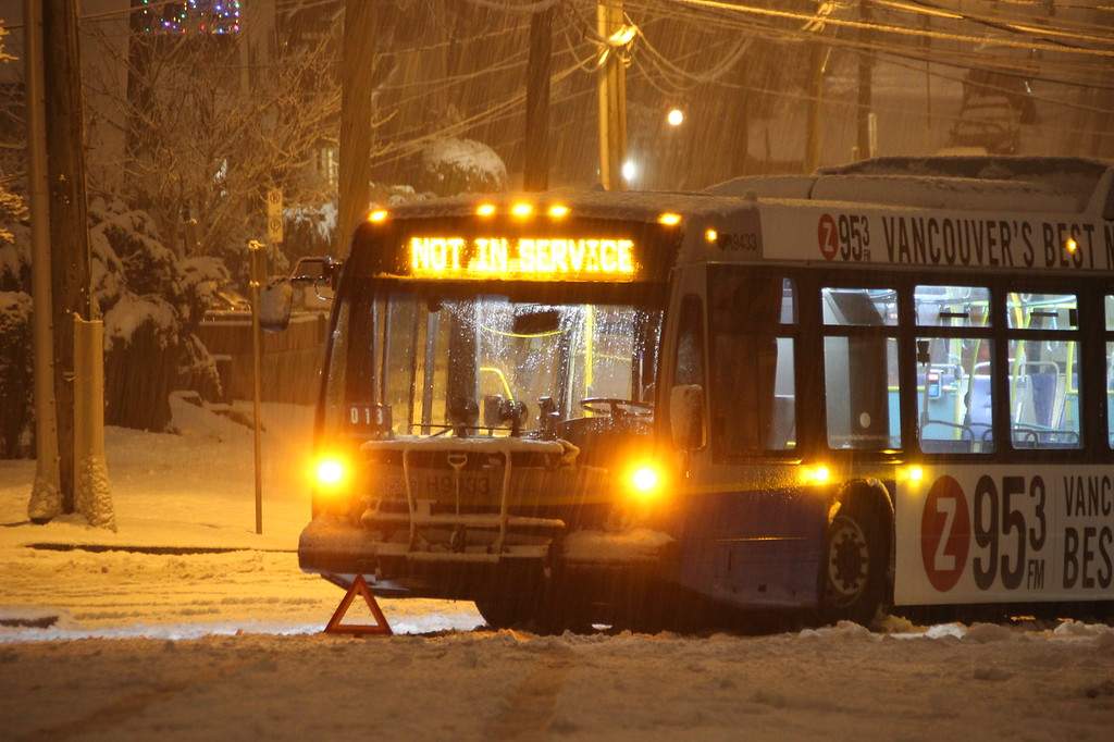 A bus got stuck in New Westminster Sunday night. Credit: Shane MacKichan.