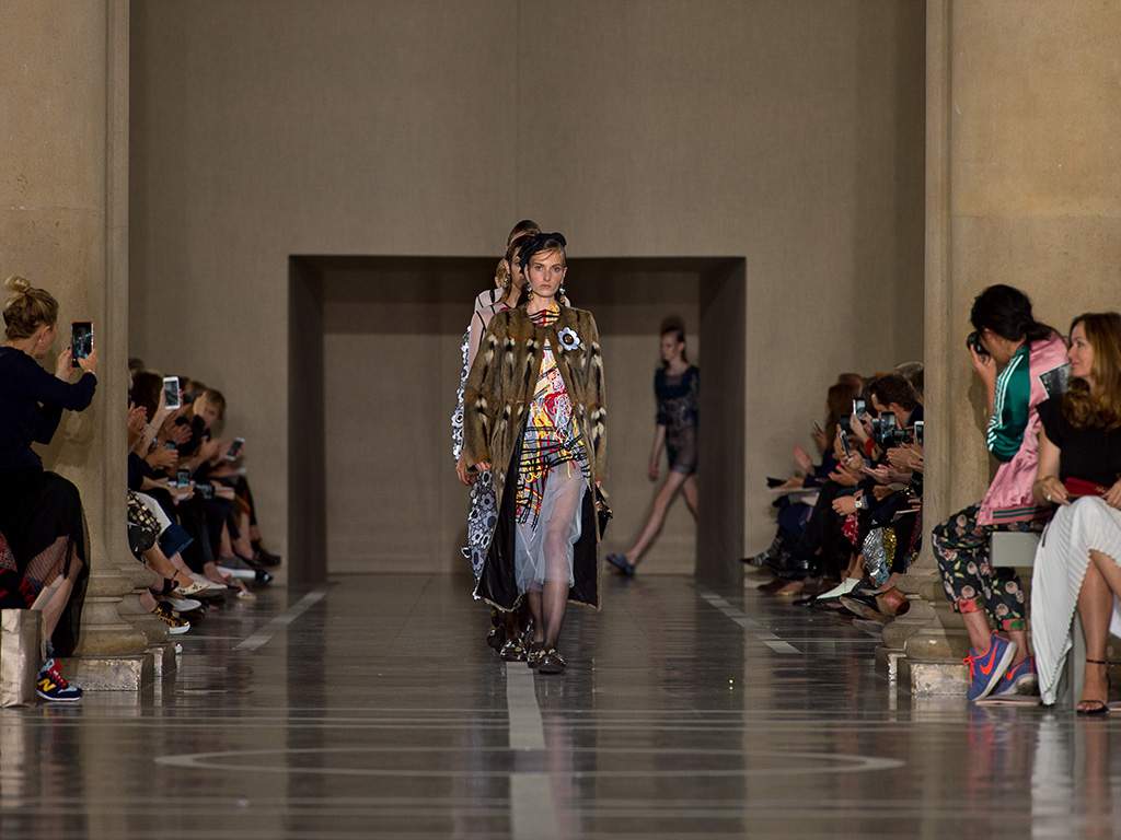 Models come down the runway for the finale of the Christopher Kane spring 2017 presentation in London on Sept. 19, 2016.