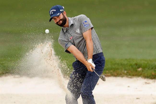 Adam Hadwin chips onto the first green during the final round of the Valspar Championship golf tournament Sunday, March 12, 2017, at Innisbrook in Palm Harbor, Fla. 