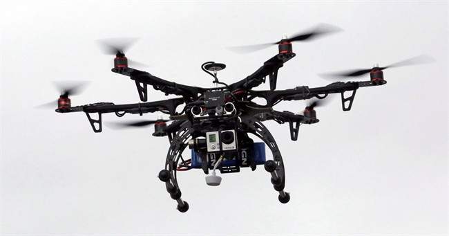 In this Feb. 13, 2014, file photo, a drone is demonstrated in Brigham City, Utah. 