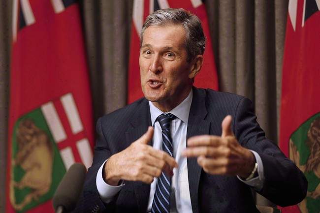 Manitoba Premier Brian Pallister speaks to media before the provincial throne speech at the Manitoba Legislature in Winnipeg, Monday, May 16, 2016.