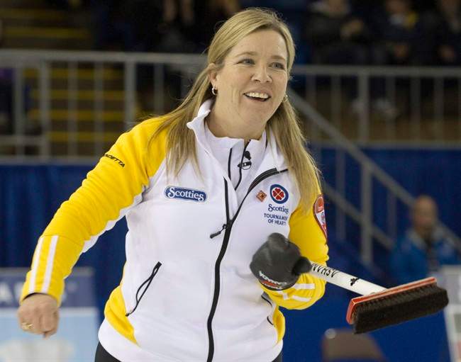 Manitoba skip Cathy Overton-Clapham smiles after making a shot against Team Canada in the night draw at the 2011 Tournament of Hearts in Charlottetown, P.E.I. on Feb. 23, 2011. Veteran curler Cathy Overton-Clapham has joined Chelsea Carey's curling team. Carey announced the move Wednesday on her team's Twitter account and said Overton-Clapham will compete with them in 2017-18. 