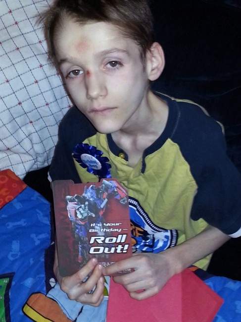Alexandru Radita is shown in a photo from his 15th birthday party, three months before his death, in this handout photo.