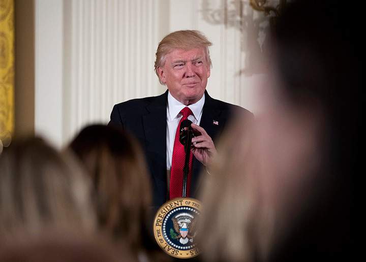 In this March 29, 2017 file photo, President Donald Trump pauses while speaking in the East Room of the White House in Washington. 