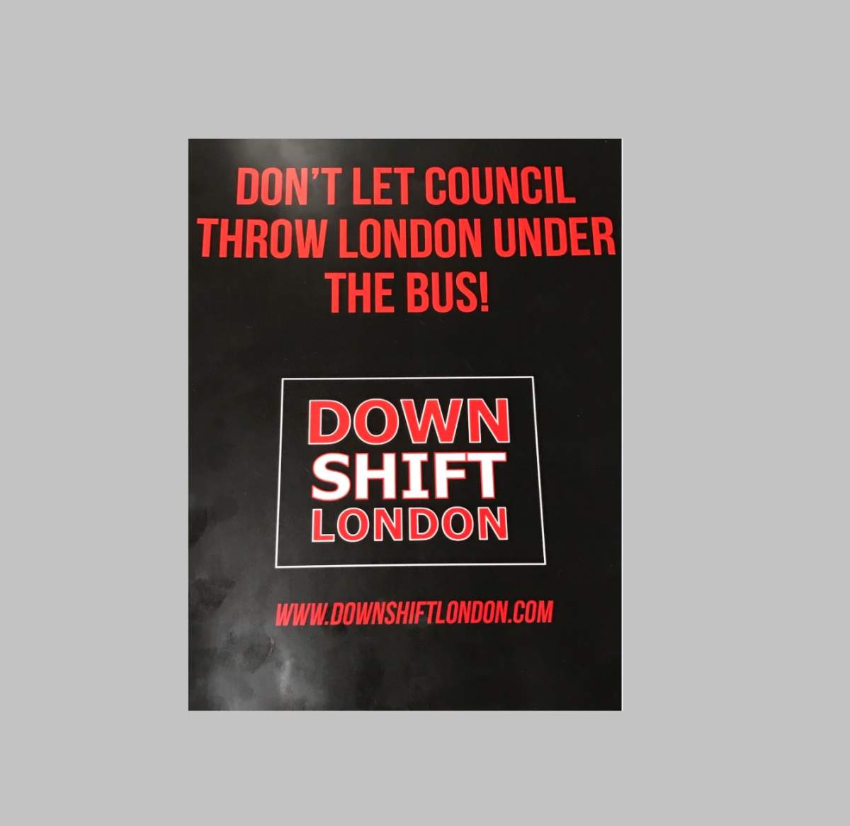 New lawn and window signs being distributed to residents and business owners by Down Shift London.