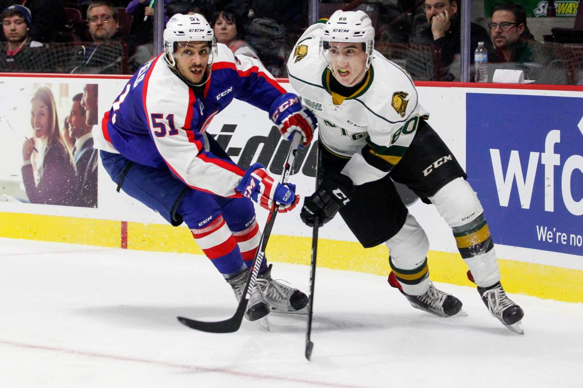 WINDSOR, ON - JANUARY 03: Defenceman Jalen Chatfield #51 of the Windsor Spitfires skates against forward Alex Formenton #80 of the London Knights on January 3, 2017 at the WFCU Centre in Windsor, Ontario, Canada. (Photo by Dennis Pajot/Getty Images).