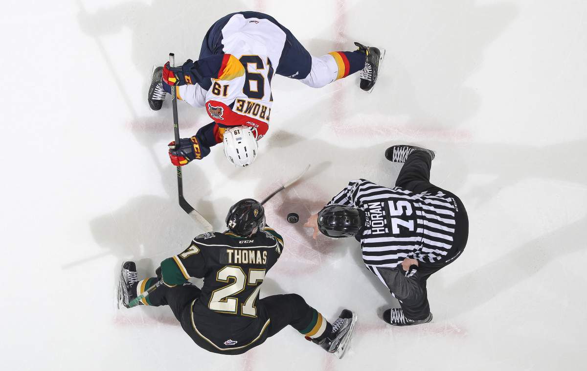 Robert Thomas #27 of the London Knights takes a faceoff against Dylan Strome #19 of the Erie Otters. (Photo by Claus Andersen/Getty Images).