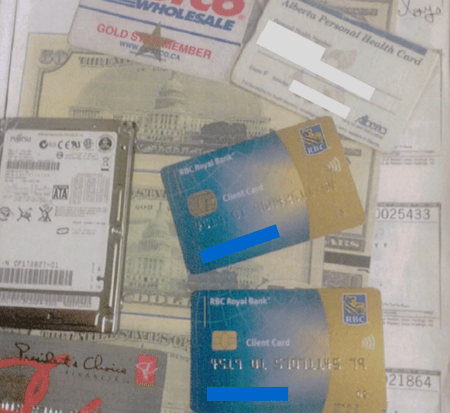 Edmonton police executed a search warrant at a home near 121 Avenue and 59 Street and found a variety of stolen identification, including bank cards, Alberta personal health cards and Costco memberships.