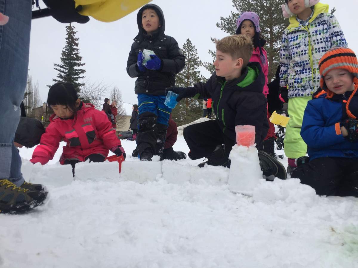 Kids build a snow castle outside of the Green Shack at Brookview Park in south west Edmonton.