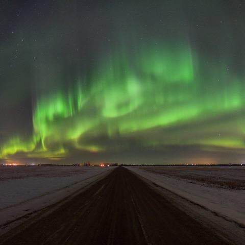 Jeff Wallace knew the aurora forecast was strong on March 1, 2017 - but had to wait some time to capture them brilliantly dancing.
