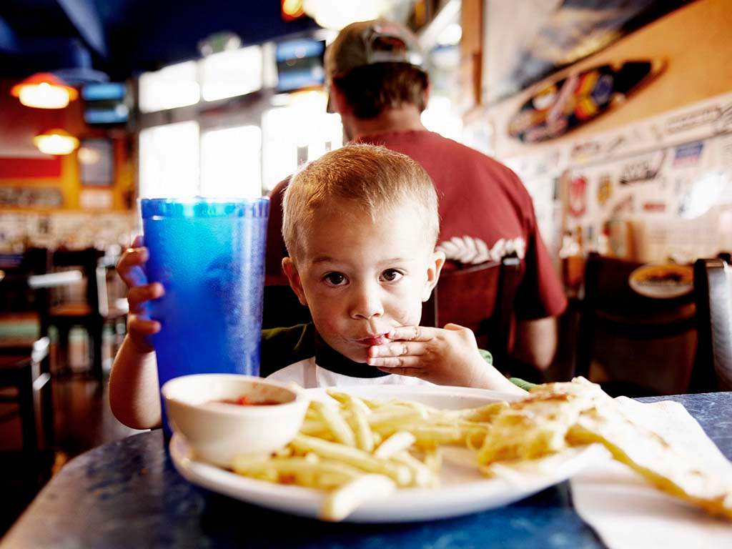 Despite efforts to the contrary, unhealthy food options continue to proliferate on restaurant kids menus.