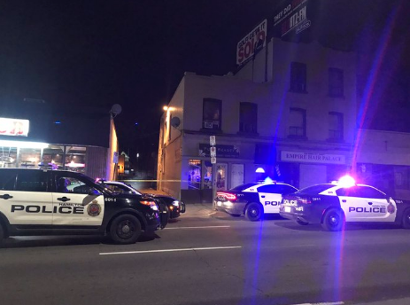 Police tape off downtown Hamilton alleyway after a man was stabbed multiple times.