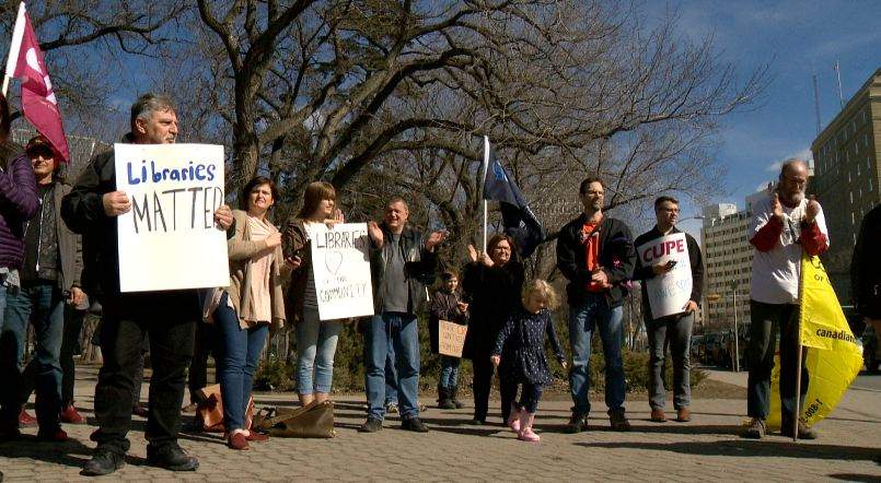 Many concerned about looming budget cuts to libraries came out to protest in downtown Regina on March 25, 2017.
