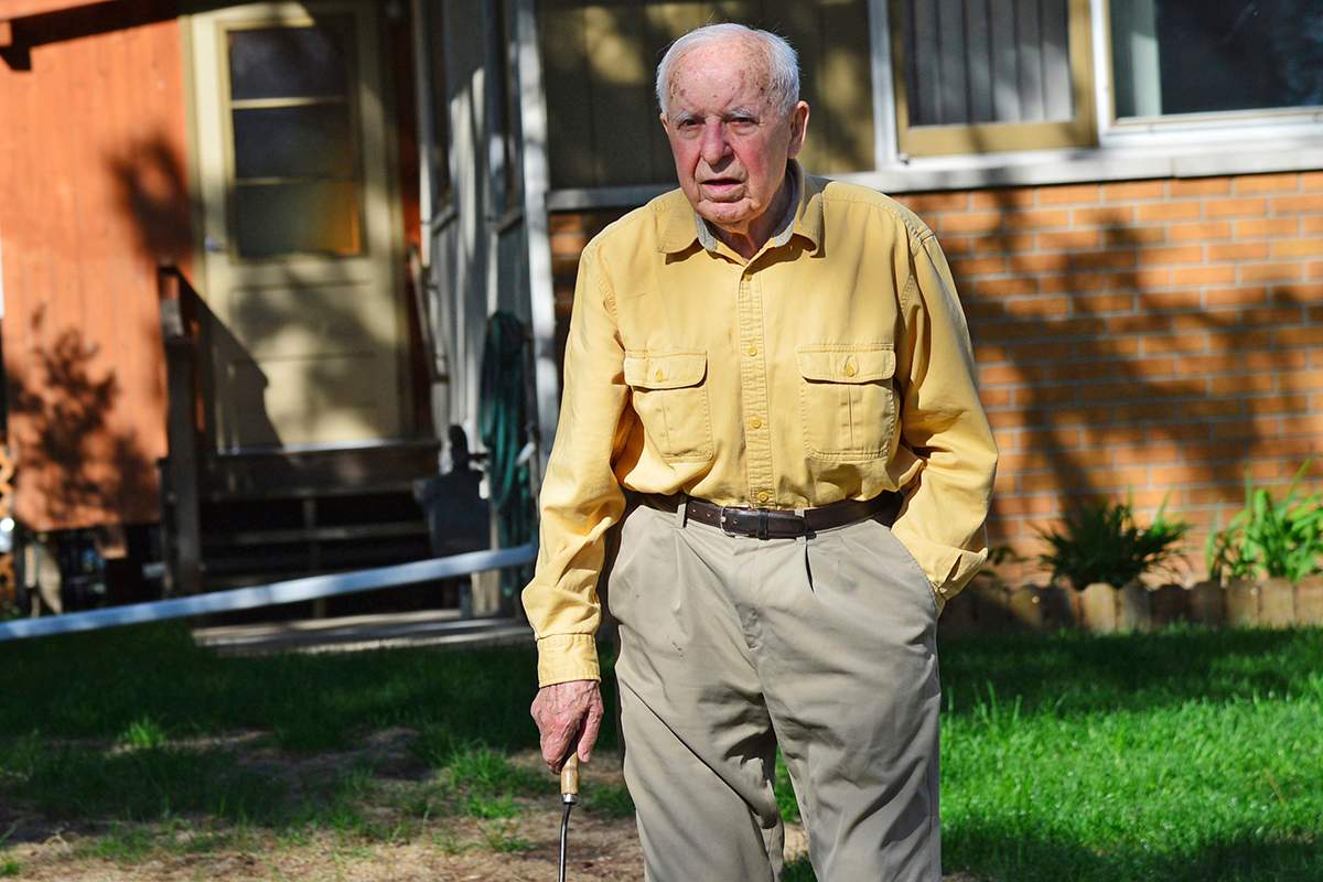 In this May 2014 photo, Michael Karkoc works in his yard in Minneapolis. 