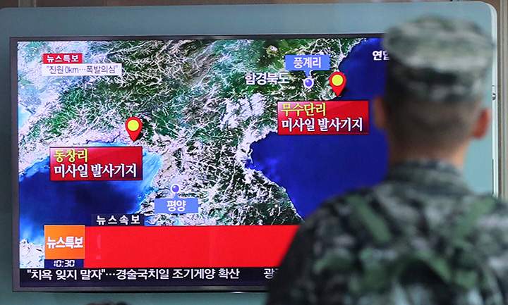 In this Sept. 9, 2016 file photo, a South Korean marine watches a TV screen reporting about North Korea's possible nuclear test at the Seoul Railway Station in South Korea. 