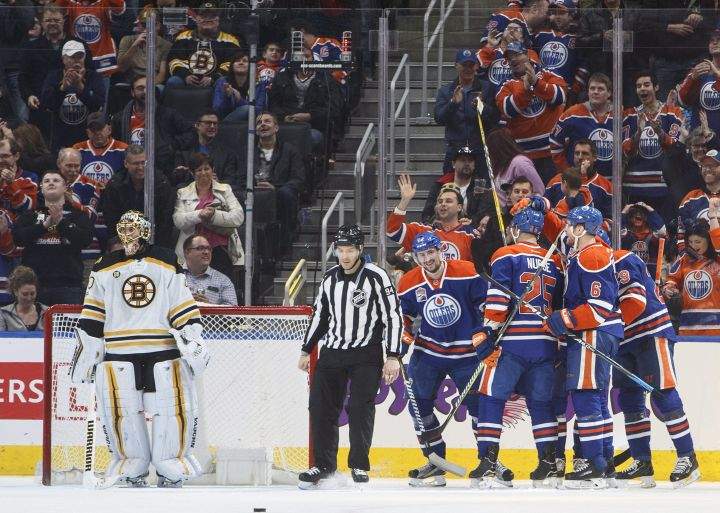 Edmonton Oilers celebrate a gaol against Boston Bruins goalie Tuukka Rask (40) during first period NHL action in Edmonton, Alta., on Thursday, March 16, 2017. 