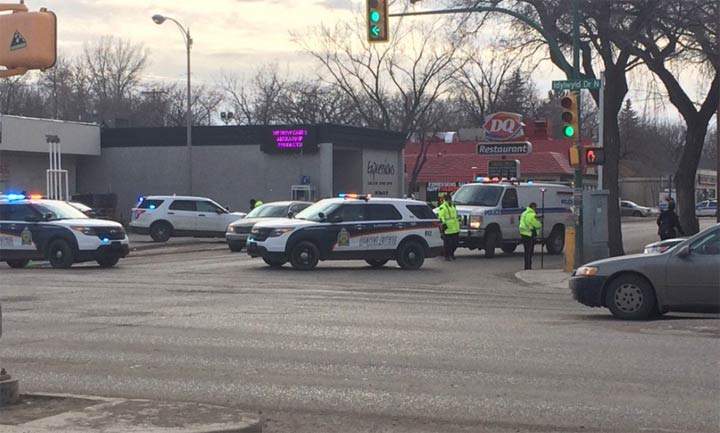 The Saskatoon Police Service are searching for a suspect after an officer was allegedly struck by a stolen vehicle.