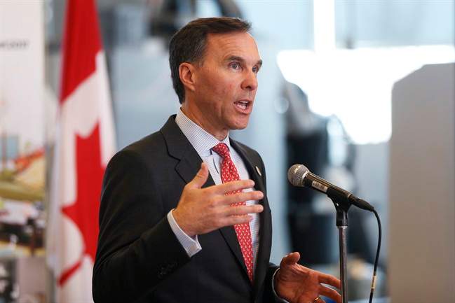 Minister of Finance Bill Morneau tours the robotics lab at the Southern Alberta Institute of Technology in Calgary, Alta., Monday, March 27, 2017.