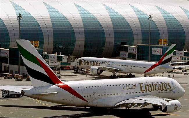 This May 8, 2014 file photo shows Emirates passenger planes at Dubai airport in United Arab Emirates. 