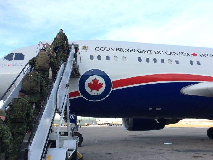 The soldiers boarded the plane just after 8 a.m. on Friday.