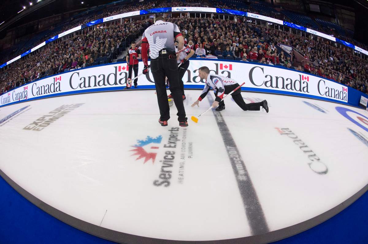 Team Canada skip Brad Gushue makes a shot during a draw against Switzerland at the Men's World Curling Championships in Edmonton, Saturday, April 1, 2017. 