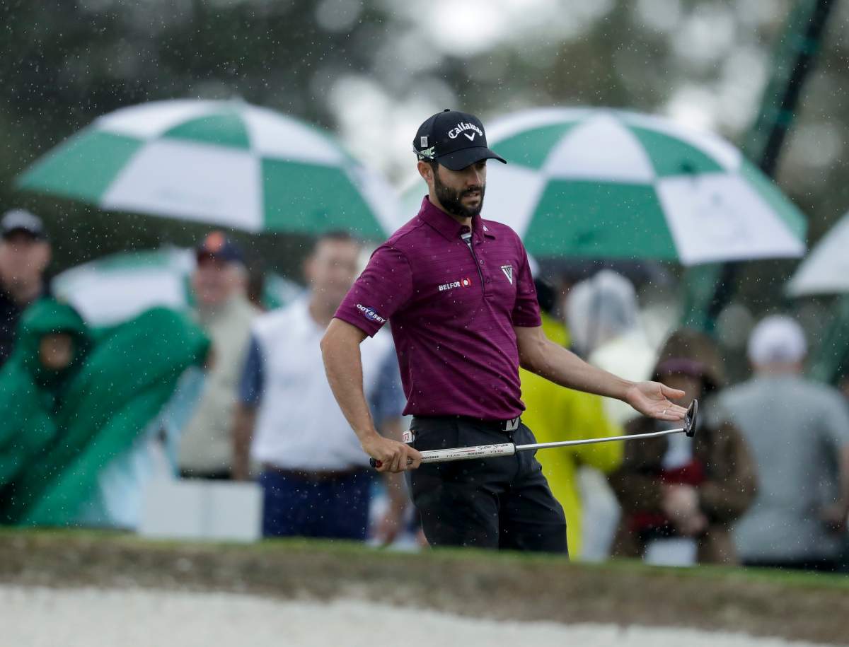 Adam Hadwin lines up his putt on the ninth hole during a practice round for the Masters golf tournament Monday, April 3, 2017, in Augusta, Ga.