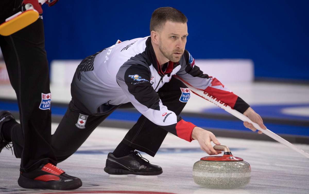 Canada skip Brad Gushue makes a shot during the 10th draw against China at the Men’s World Curling Championships in Edmonton, Tuesday, April 4, 2017. THE CANADIAN PRESS/Jonathan Hayward