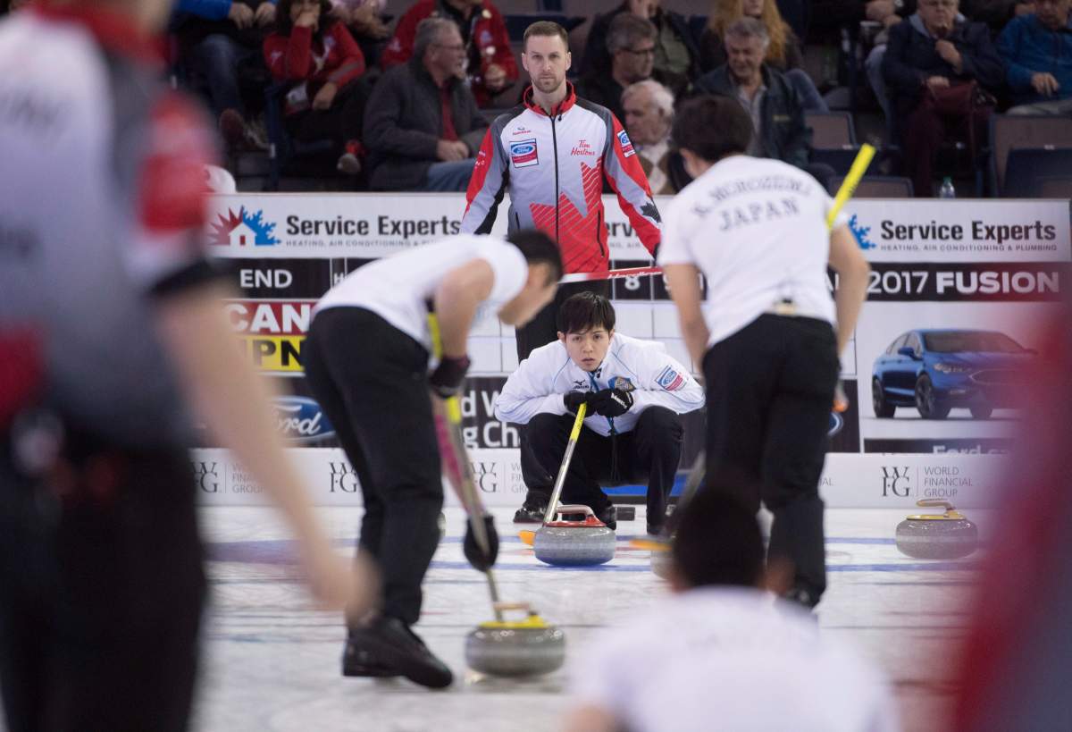 Team Canada skip Brad Gushue looks on as Japan skip Yusuke Morozumi brings a shot into the house during the 13th draw at the Men’s World Curling Championships in Edmonton, Wednesday, April 5, 2017. THE CANADIAN PRESS/Jonathan Hayward