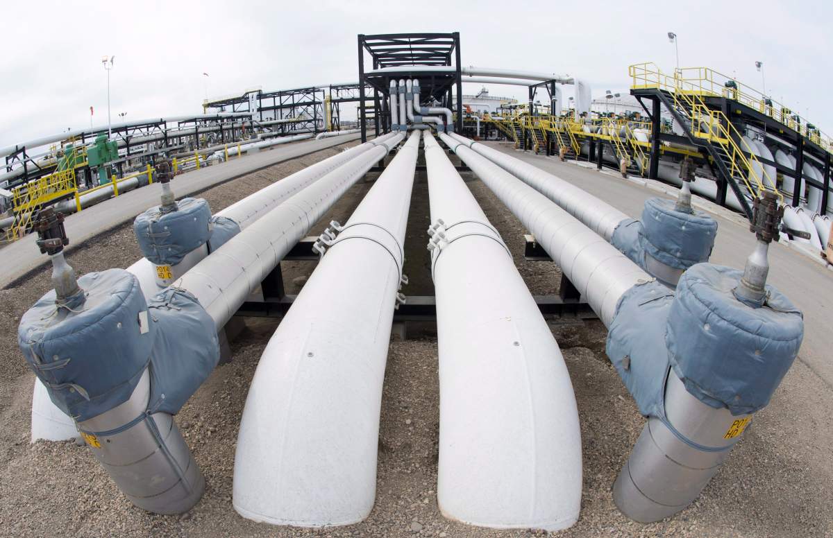 Pipes are seen at the Kinder Morgan Trans Mountain facility in Edmonton, Alta., Thursday, April 6, 2017. THE CANADIAN PRESS/Jonathan Hayward.