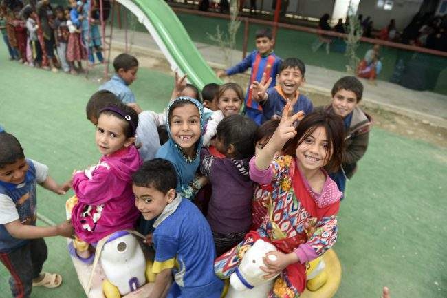 Children play at the Hammam al-Alil refugee camp near Mosul, Iraq, April 12, 2017.