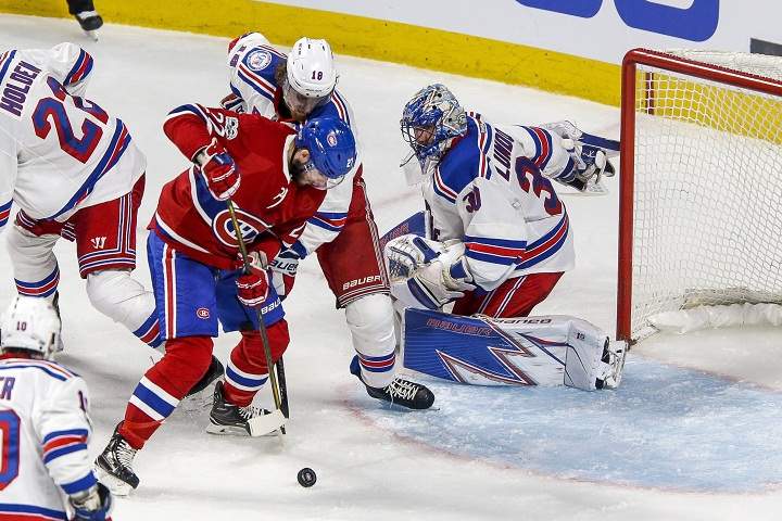 Mandatory Credit: Photo by John Crouch/Cal Sport Media/REX/Shutterstock (8607522ad) Montreal Canadiens center Alex Galchenyuk (27) fights for loose puck with New York Rangers defenseman Marc Staal (18) as New York Rangers goalie Henrik Lundqvist (30) prepares to make save during the New York Rangers and Montreal Canadiens NHL playoff game at Bell Centre in Montreal, QC. New York defeated Montreal 2-0 NHL Rangers vs Canadiens, Montreal, USA - 12 Apr 2017