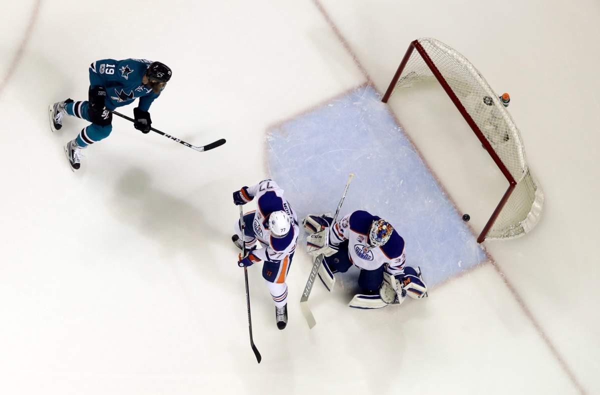Edmonton Oilers goalie Cam Talbot, center, right, is beaten for a goal on shot from San Jose Sharks’ Joe Pavelski, not seen, during the first period in Game 4 of a first-round NHL hockey playoff series Tuesday, April 18, 2017, in San Jose, Calif. (AP Photo/Marcio Jose Sanchez)