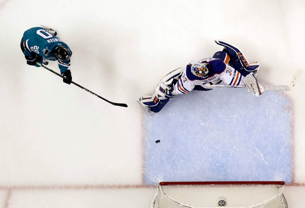 San Jose Sharks right wing Marcus Sorensen, left, scores past Edmonton Oilers goalie Cam Talbot during the second period in Game 4 of a first-round NHL hockey playoff series Tuesday, April 18, 2017, in San Jose, Calif. (AP Photo/Marcio Jose Sanchez)