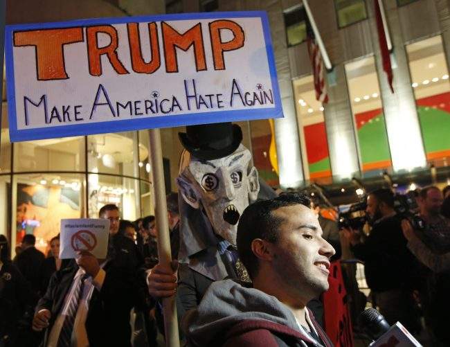 Juan Escalante, of the immigration reform group America's Voice, conducts interviews in New York, Nov. 4, 2015. 


