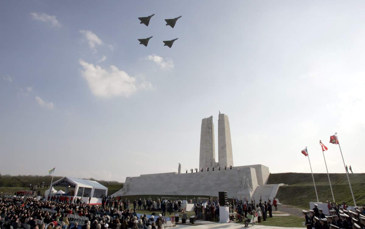 French warplanes fly over the Canadian National Vimy Memorial Monday, April 9, 2007 during the 90th anniversary of a breakthrough World War I victory by Canadian troops over the Germans in Vimy Ridge, Northern France.