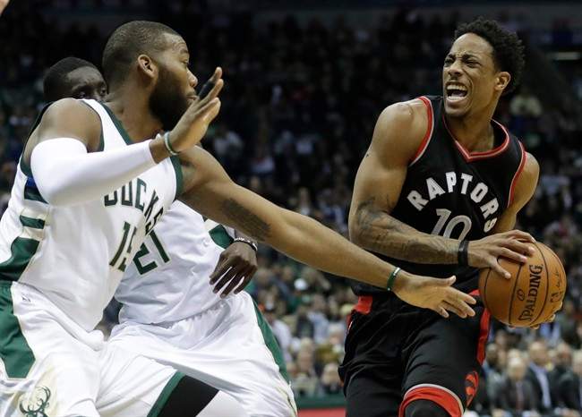 Toronto Raptors’ DeMar DeRozan drives against Milwaukee Bucks\’ Greg Monroe during the first half of game 6 of an NBA first-round playoff series basketball game Thursday, April 27, 2017, in Milwaukee.