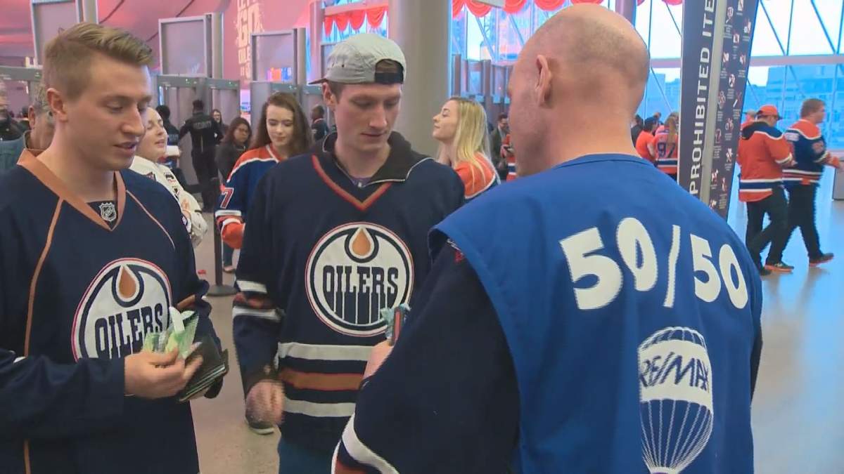 The Edmonton Oilers Community Foundation sells 50/50 tickets at Friday's Oilers watch party at Rogers Place, April 28, 2017.