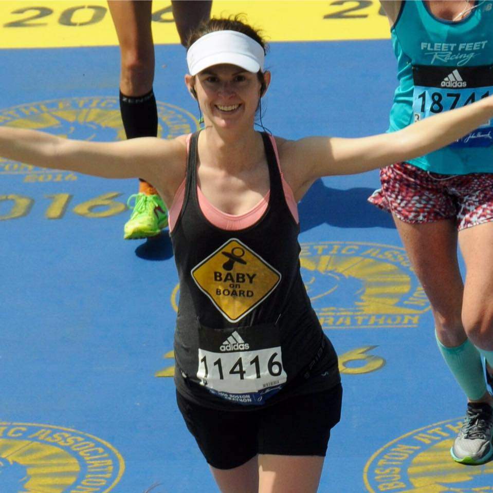 Rochelle Johnston crosses the finish line of the Boston Marathon