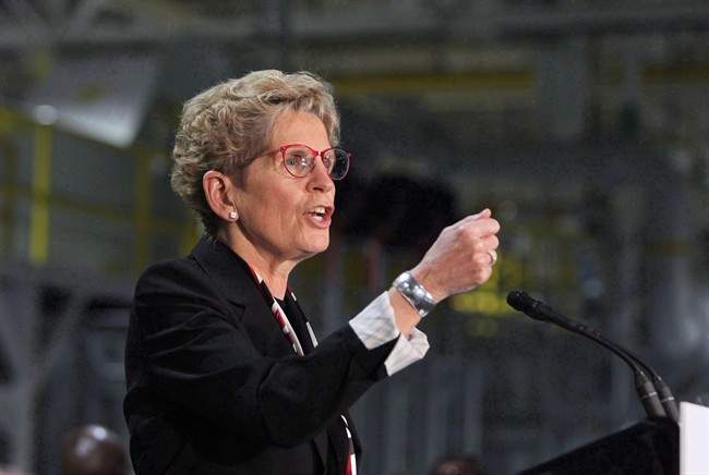 Ontario Premier Kathleen Wynne did not say Monday what the province's new minimum wage would be.