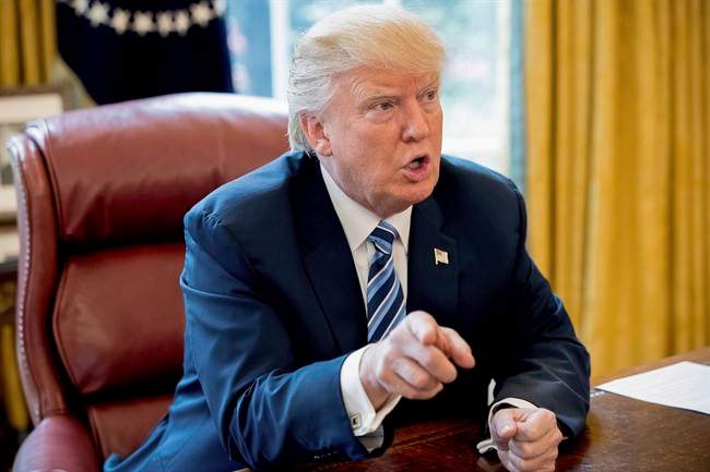 President Donald Trump speaks to Associated Press Chief White House Correspondent Julie Pace in the Oval Office in Washington, Wednesday, April 19, 2017.