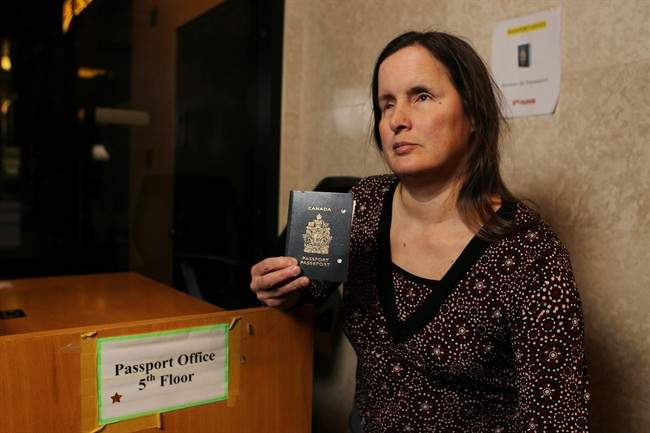 Rebecca Blaevoet, who is blind is fighting for better customer service access for the visually impaired at Passport Canada in Windsor, Windsor, Ontario on Thursday, March 30, 2017. THE CANADIAN PRESS/Dave Chidley.