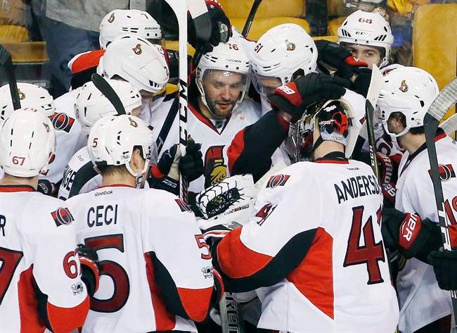 Ottawa Senators’ Clarke MacArthur (16) celebrates with teammates after scoring during overtime in game six of a first-round NHL hockey Stanley Cup playoff series against the Boston Bruins, Sunday, April 23, 2017, in Boston. The Senators won 3-2.